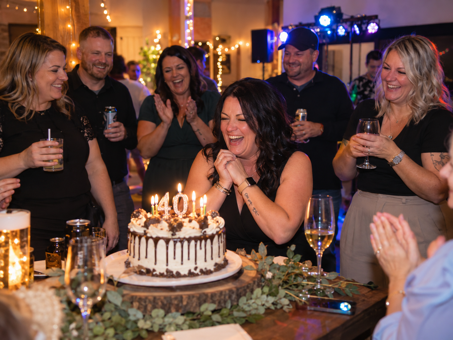 Friends celebrating a milestone birthday at an indoor party